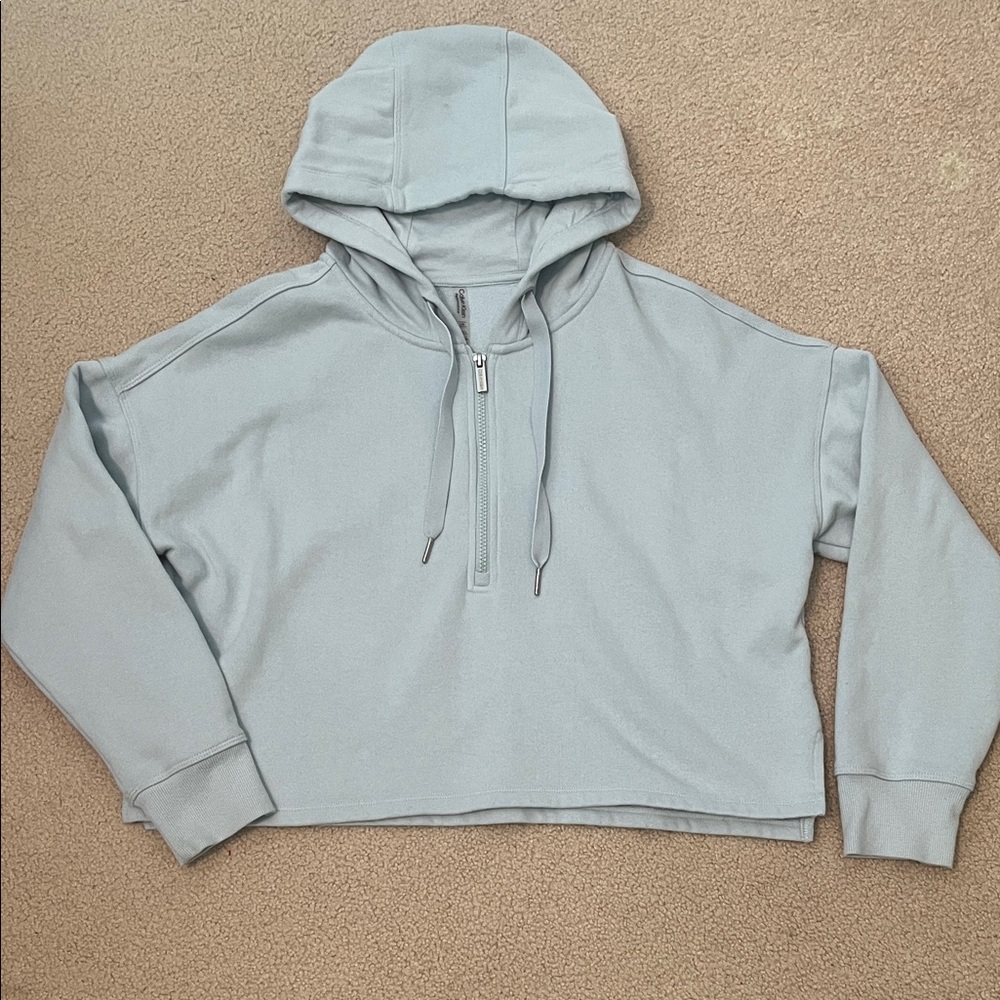 Calvin Klein Performance cropped sweatshirt hoodie in light blue.